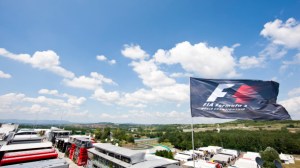 BUDAPEST, HUNGARY - JULY 24: The FIA flag flaps in the wind above the paddock during previews ahead of the Hungarian Formula One Grand Prix at Hungaroring on July 24, 2014 in Budapest, Hungary. (Photo by Drew Gibson/Getty Images)